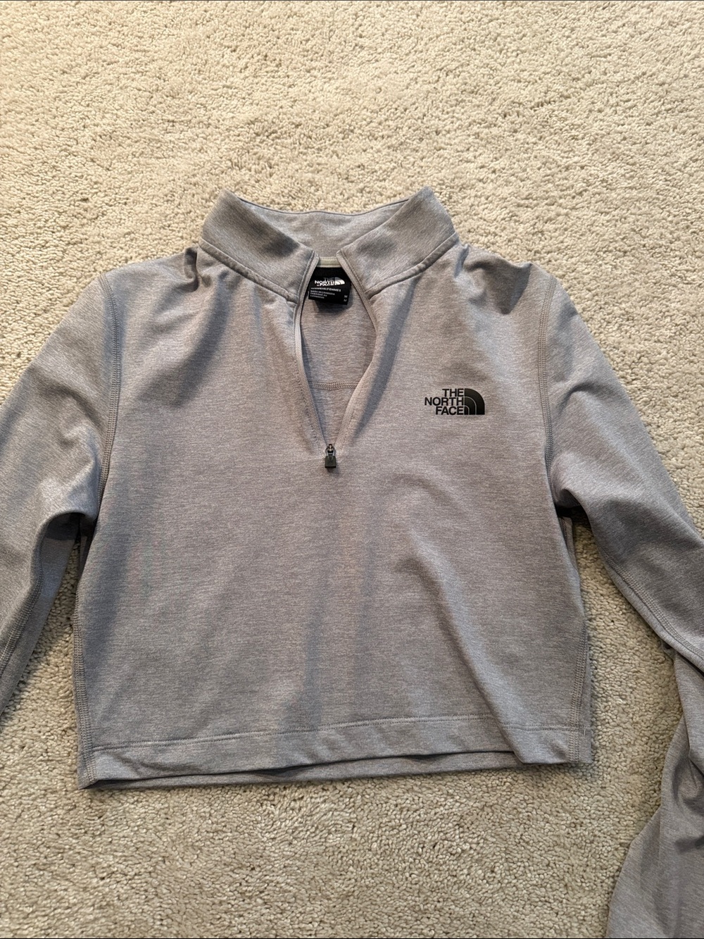 The North Face cropped quarter zip top